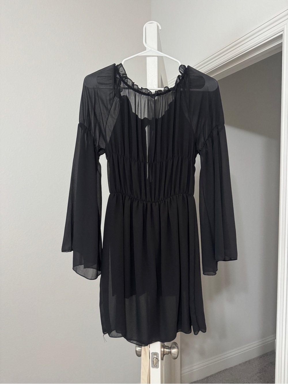 Black Long-Sleeve Sheer Mini Dress with Ruffled Neckline